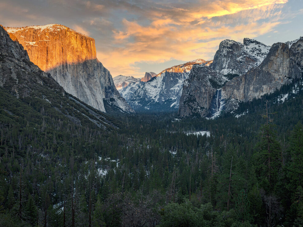 Tunnel View in winter dusk, featuring El Capitan, Half Dome, and Bridalveil Fall.